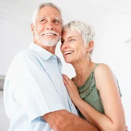 An image of a couple smiling