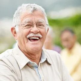 An image of a man smiling
